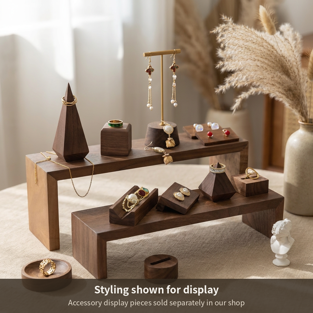 Walnut display riser stand set styling with earrings, rings, and necklace on risers