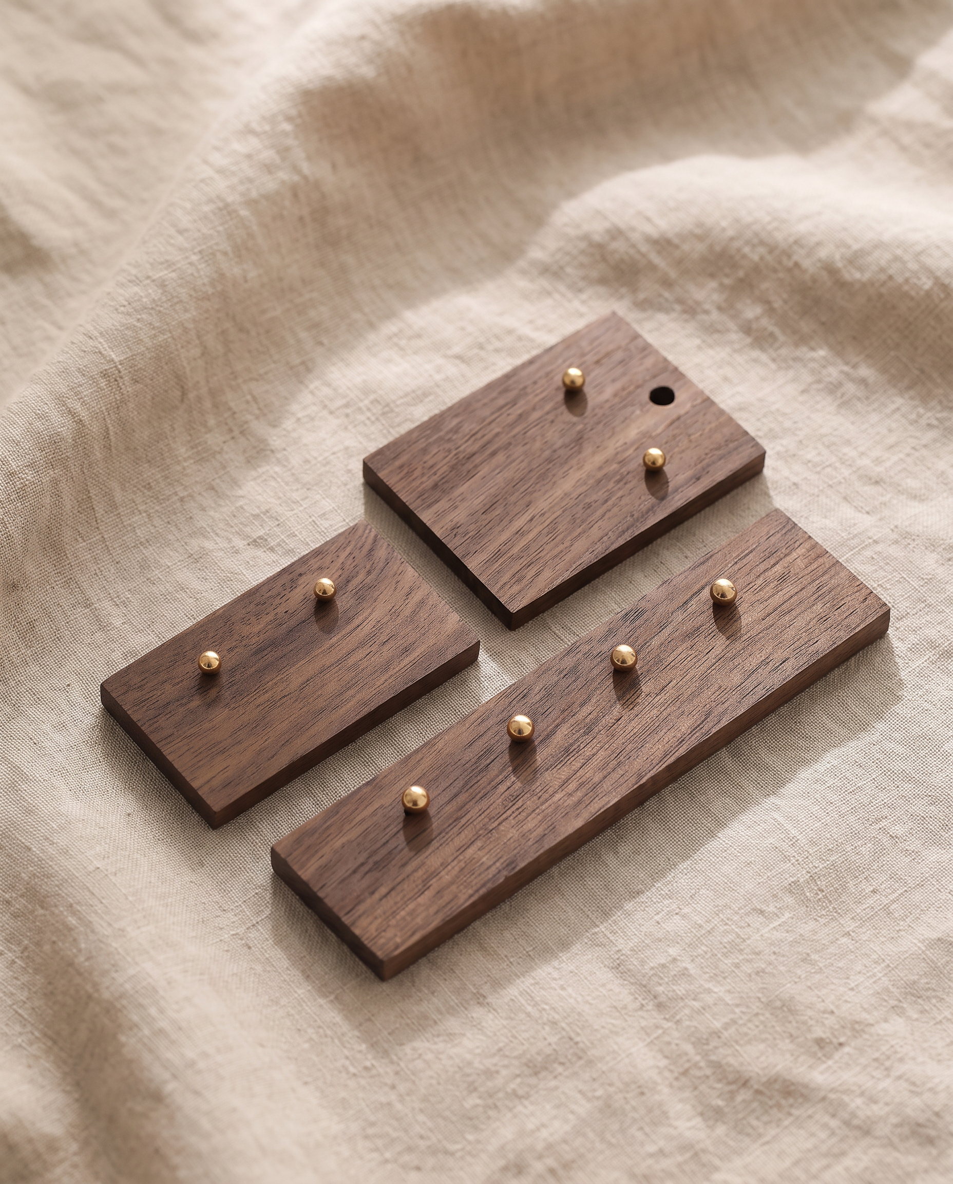 Walnut earring holder boards with gold post studs, dark wood set of three pieces