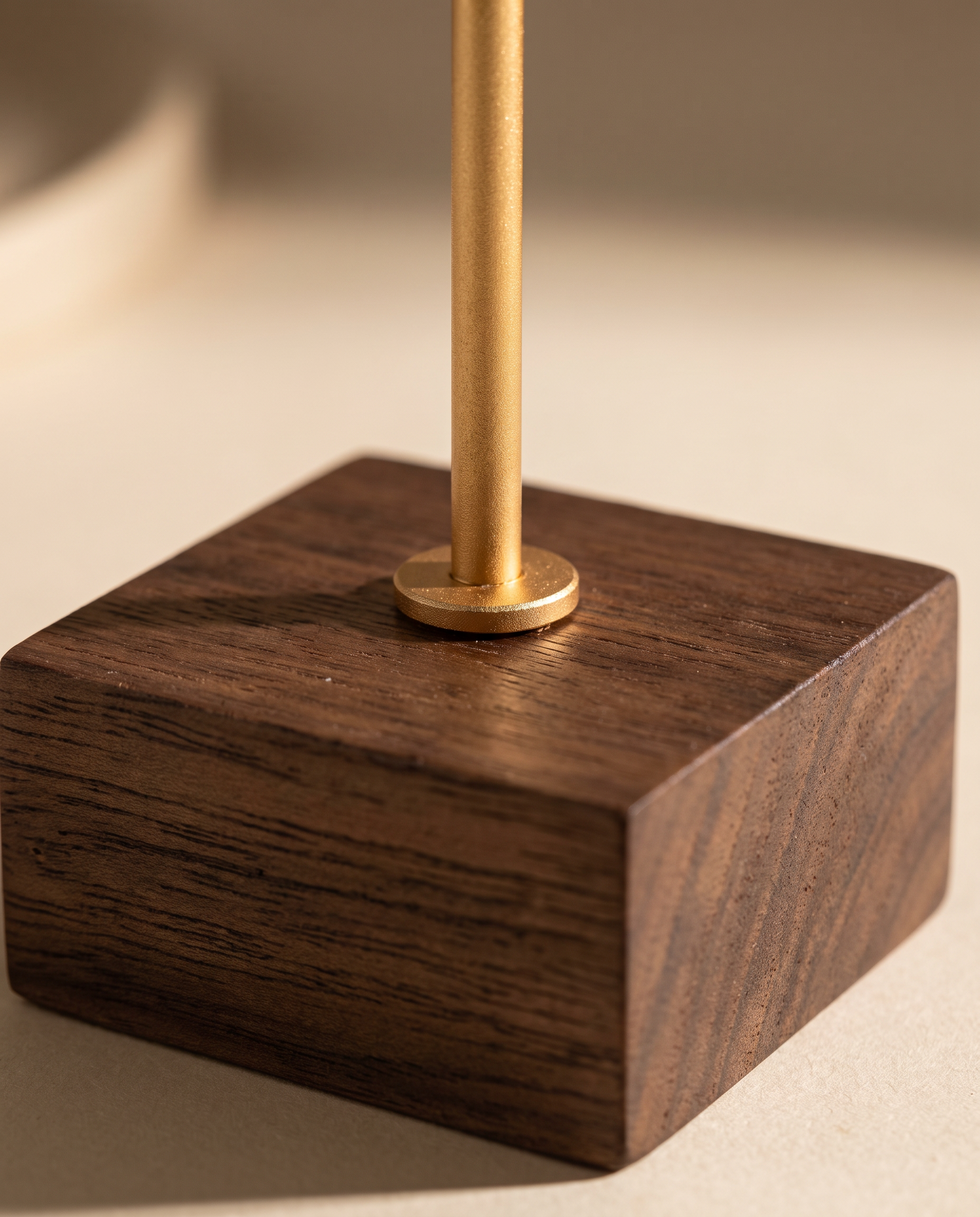 Walnut base with brass vertical post for T-bar earring stand