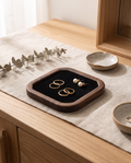 Small square jewelry tray with black velvet insert in walnut frame
