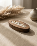 Walnut oval ring stand with velvet channel for rings