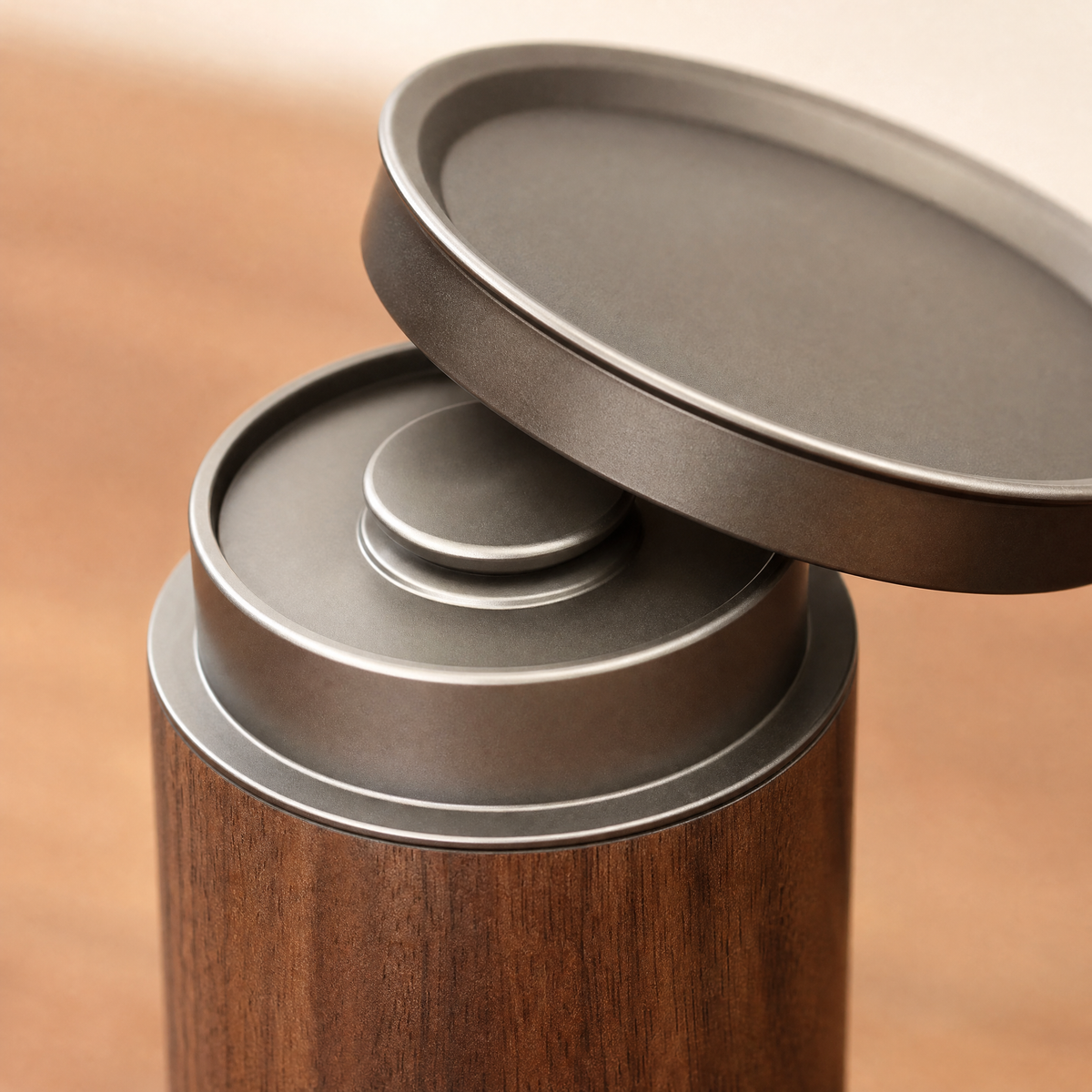Both aluminium lids of the walnut coffee canister, inner and outer
