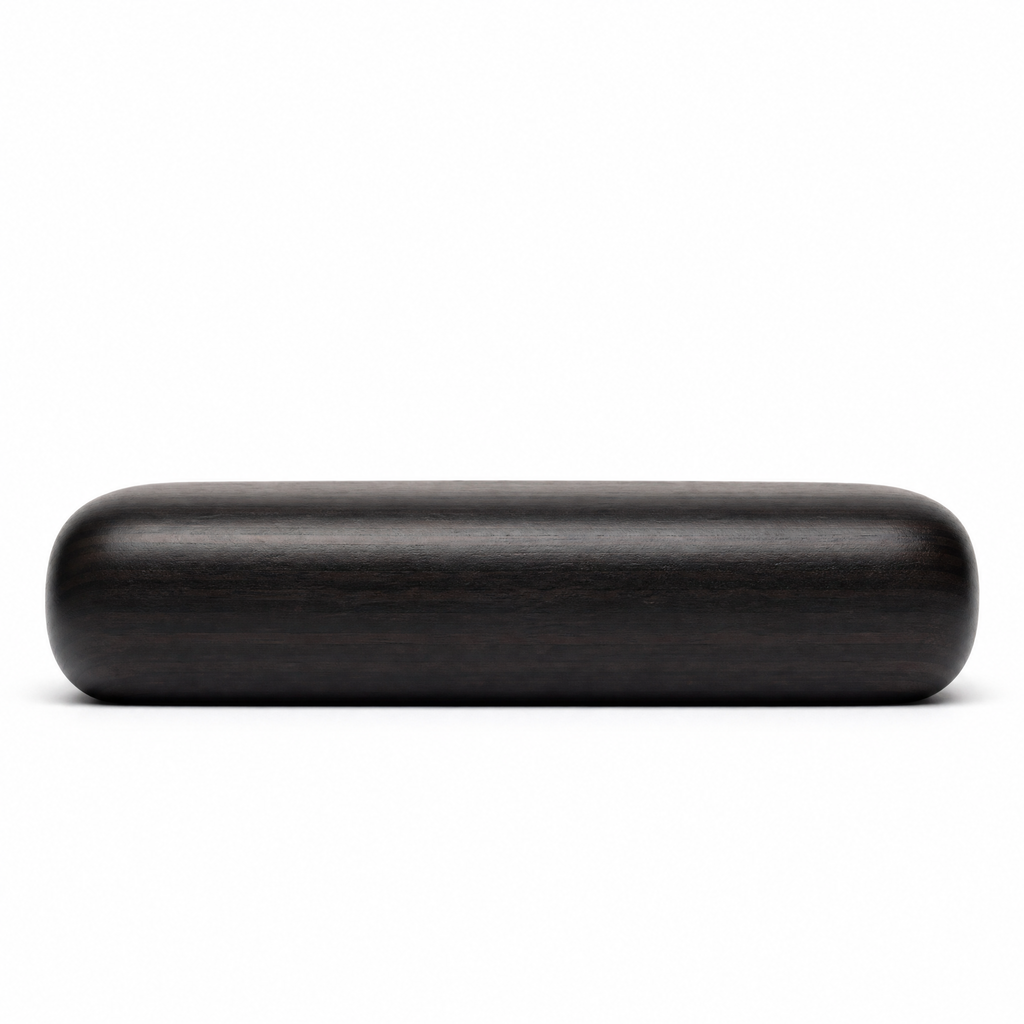 Low-profile ebony tissue box cover side view, smooth rounded wood shape