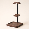 Height-adjustable headphone and controller stand with walnut base tray and black pole
