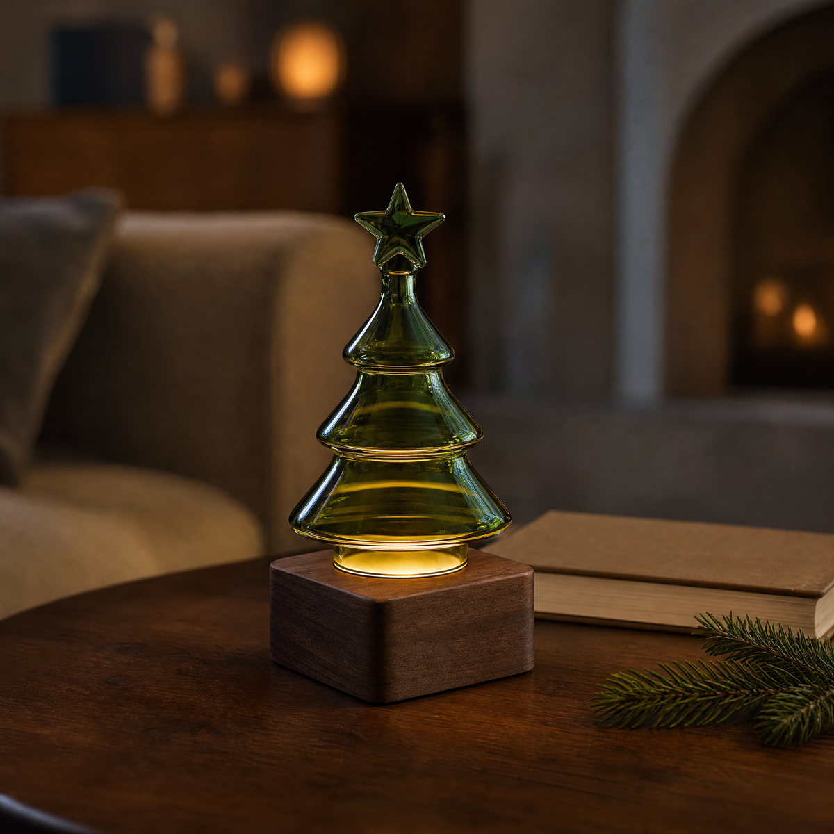 Lighted green glass Christmas tree diffuser with star topper on walnut base