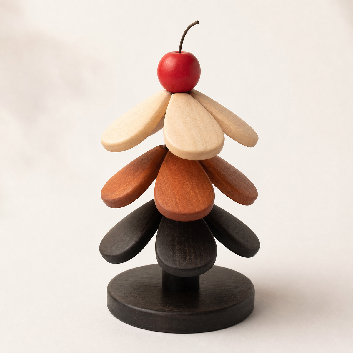Wooden Christmas tree trivet with cherry topper and stacked leaf tiers