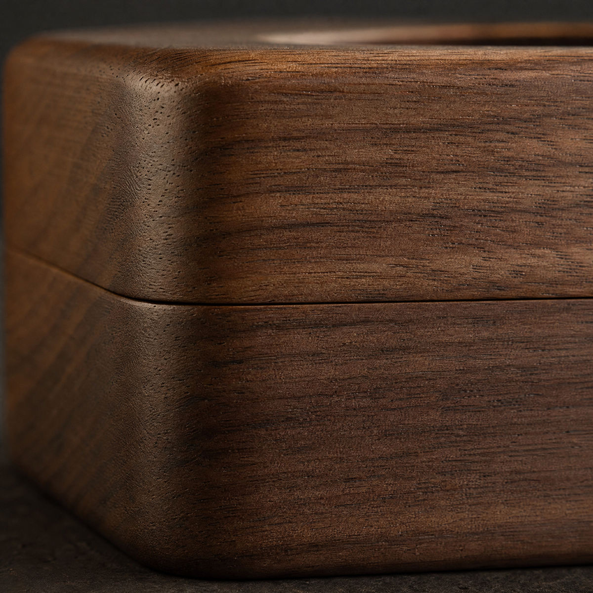 Walnut tissue box close-up showing wood grain and lid seam