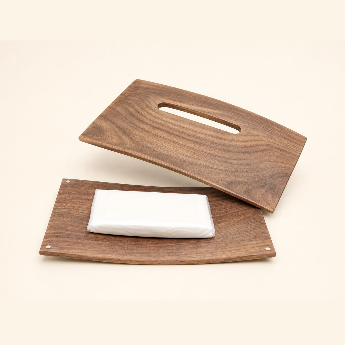 The two boards apart with a slim tissue pack on the base board, corner magnets visible