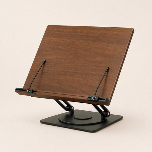 Solid walnut book and laptop stand: plain walnut board with a bottom ledge and sliding page clips, two folding aluminium arms, 360° base