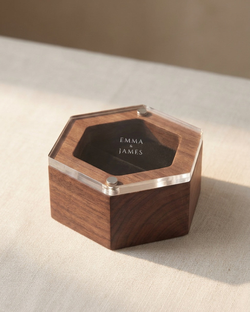 Walnut hexagon ring box with clear lid, black velvet insert, and engraved top